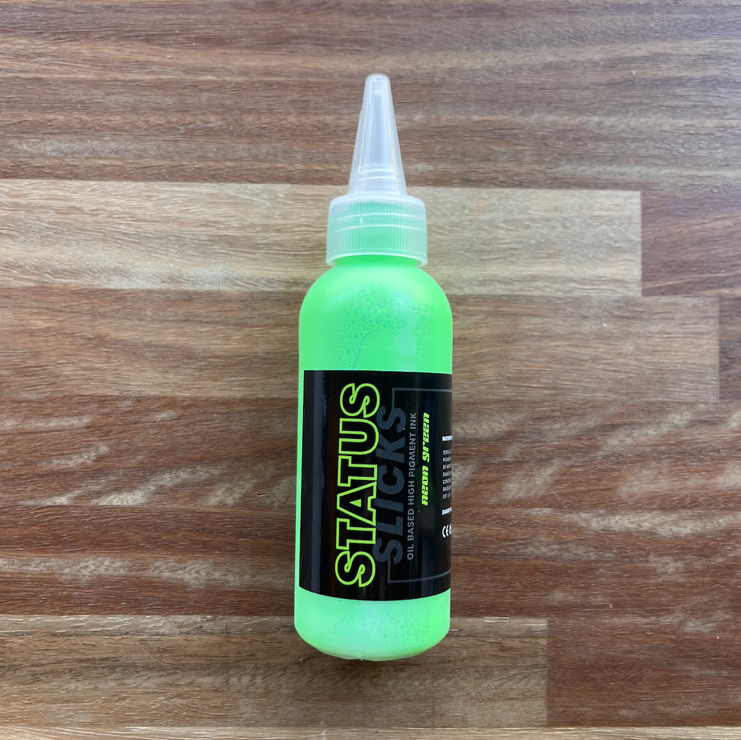 Status - Slicks Ink