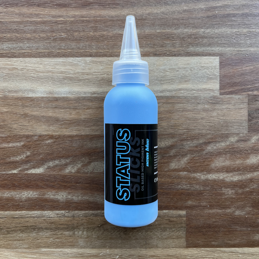 Status - Slicks Ink