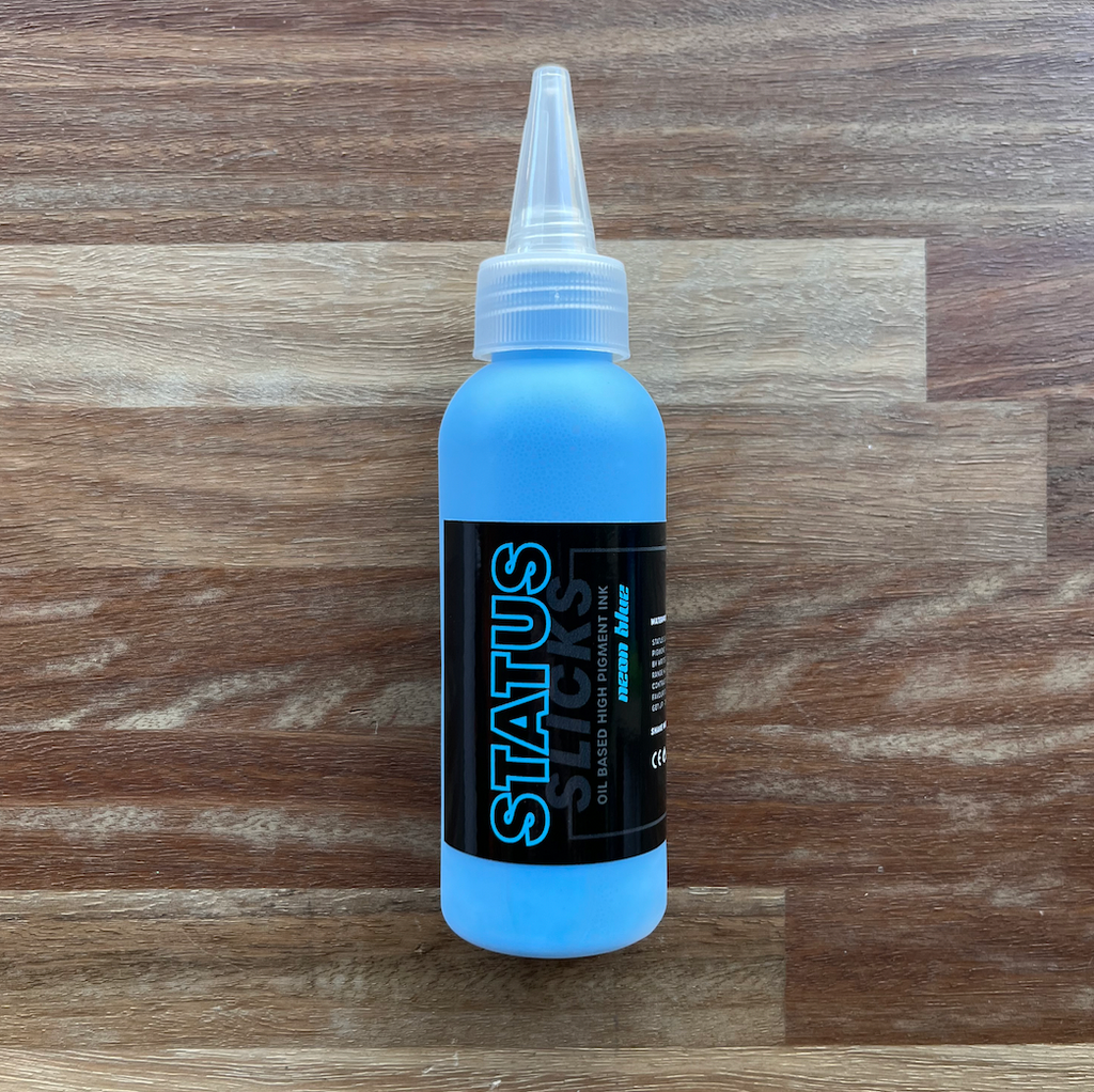 Status - Slicks Ink