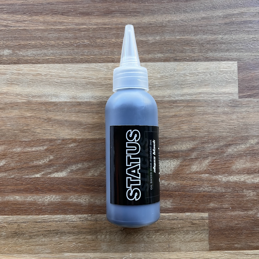 Status - Slicks Ink